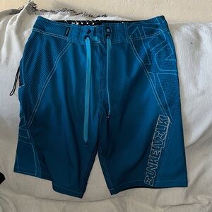 DunkelVolk Blue white and black Board Shorts size 30 damaged